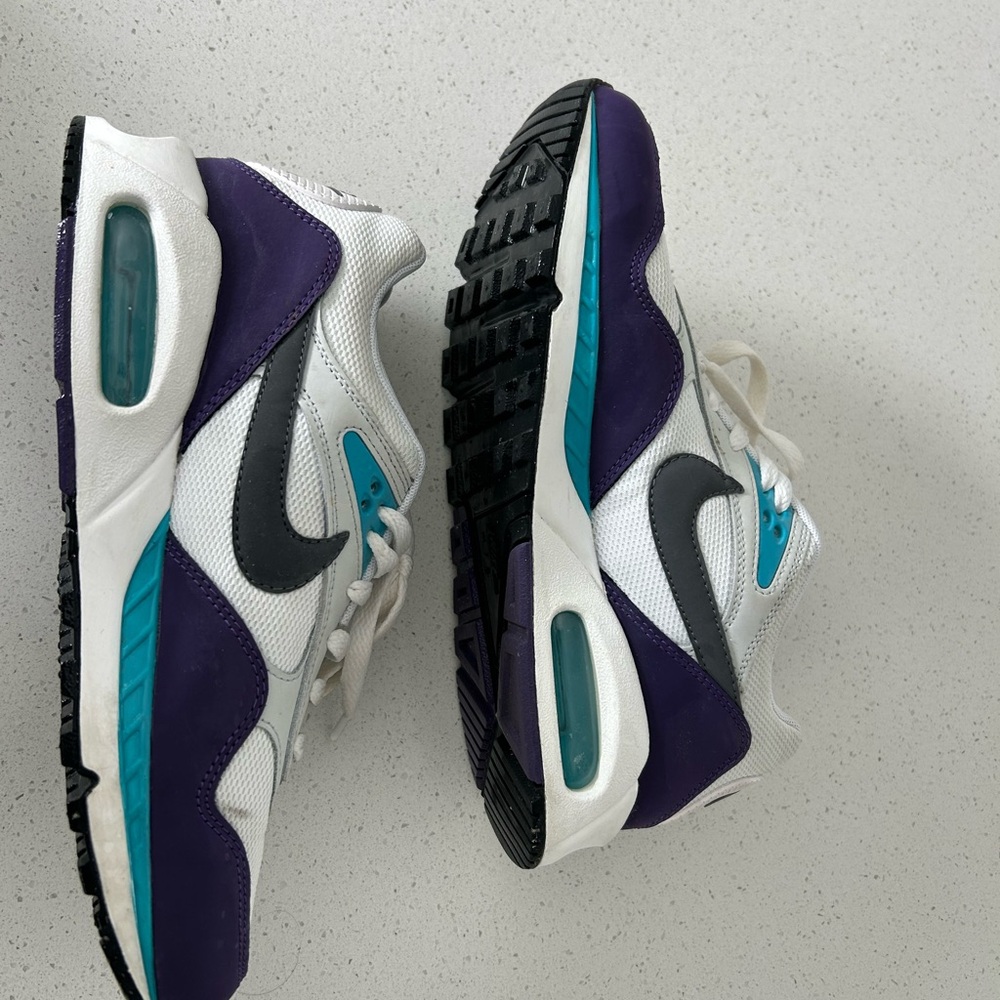 Nike Air women’s s White and Purple Sneakers with Teal Accents